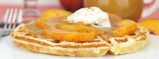 Peach Waffles with Peach Syrup And Whipped Cream