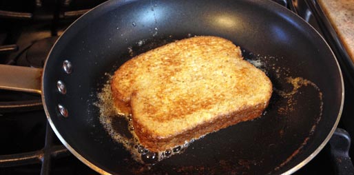 Frying Peanut Butter And Jelly French Toast
