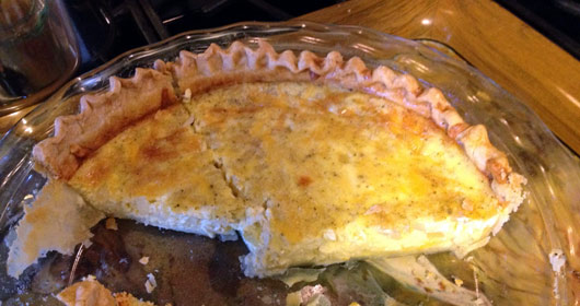 Partially Eaten Cheese And Onion Quiche