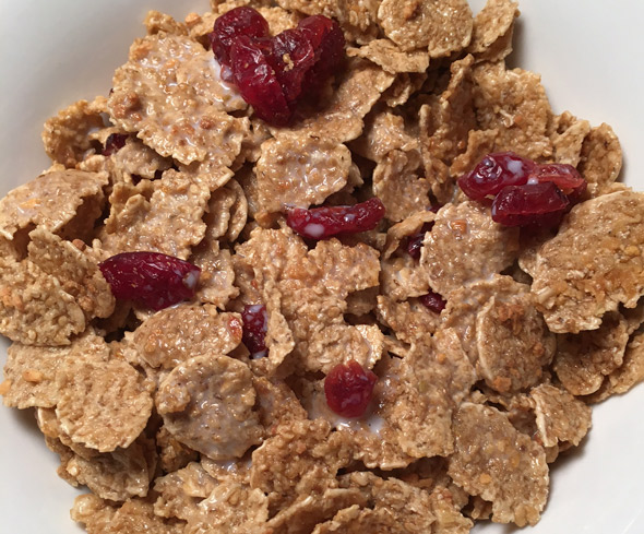 A bowl of Quaker Cranberry Apple Multigrain Flakes Cereal