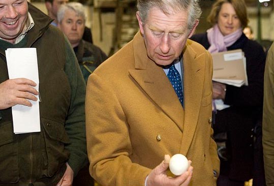 Prince Charles Examines An Egg