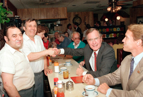 George H.W. Bush having coffee