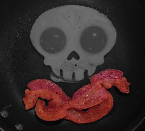 Breaded Bacon Under A Skull Made Of Eggs