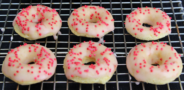 Mini Baked Cake Donuts With Berry Jam Icing